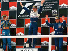 Schumacher (2nd) applauding to Hill (1st) and Blundell (3rd), they really deserved it.